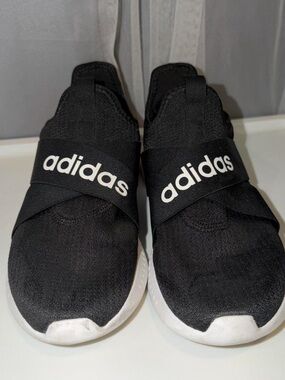 adidas Women’s Puremotion Adapt Running Shoes in the “Core Black / Cloud White”